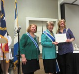 Regent Accepts Award Photo
