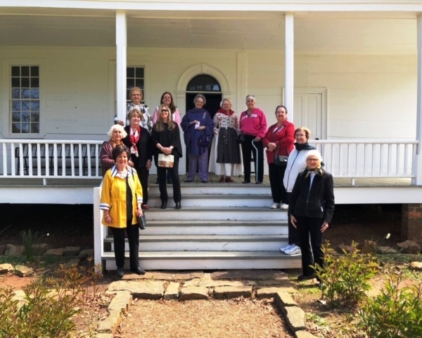 Group on Steps of house