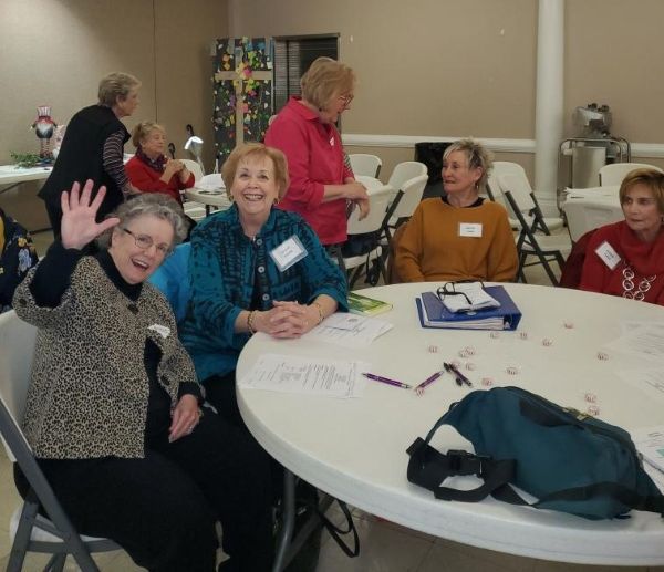 Daughters attend a monthly meeting. Chapter Meeting