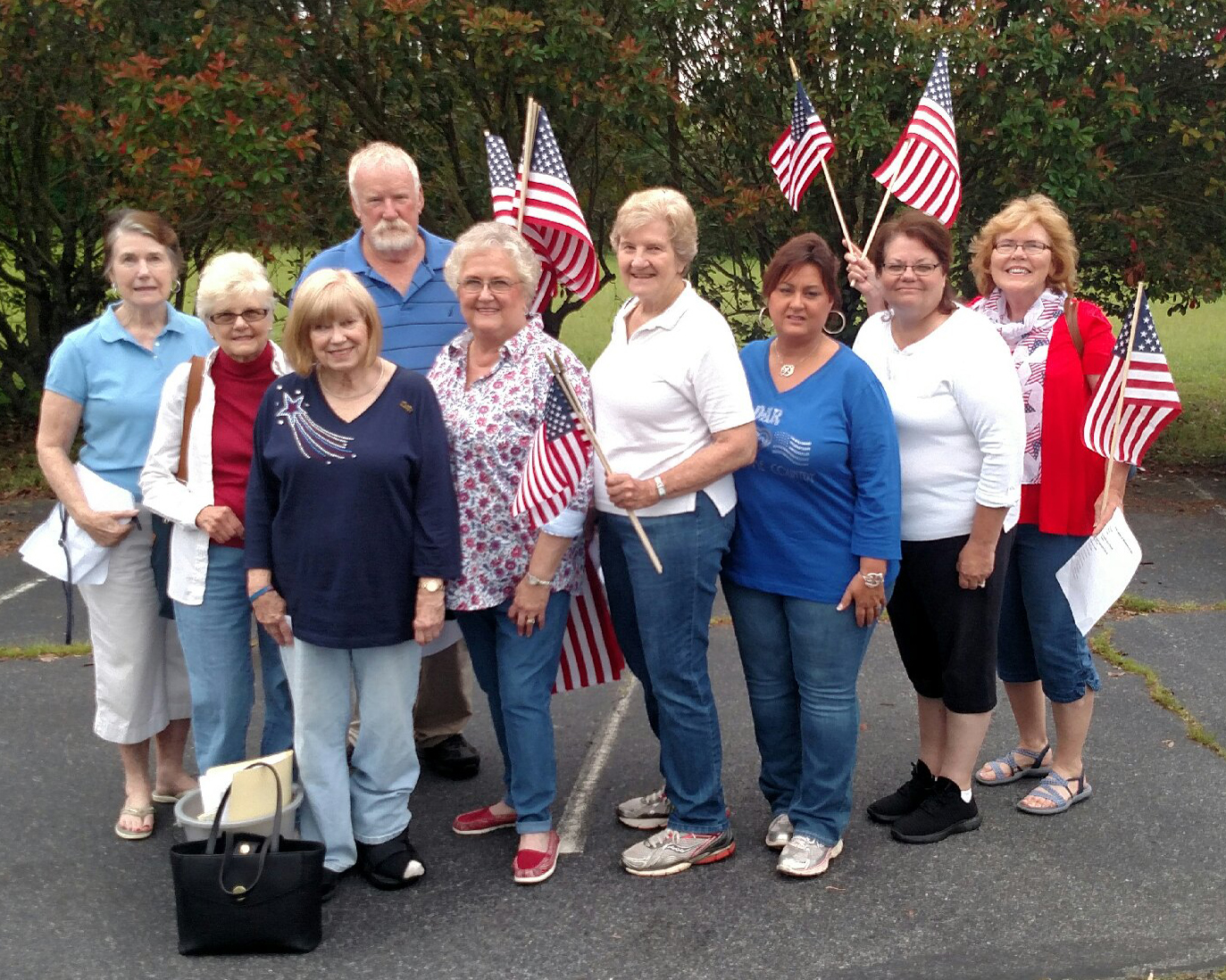 Putting Flags On Veteran Graves Photo